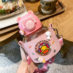 Linda botella de agua de pato de dibujos animados