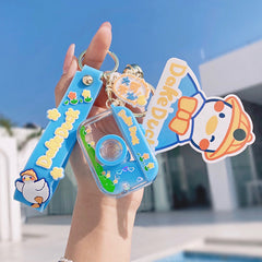 Llavero flotante con cámara de arenas movedizas de la serie Dake Duck