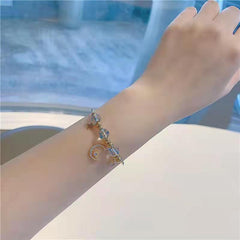 Pulsera de luna y estrella de melocotón
