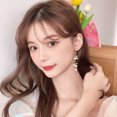 Pendientes vintage de lirio de los valles con perlas