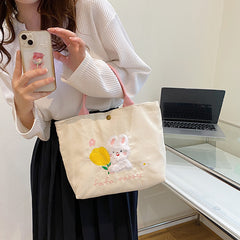 Bolsa de mano con diseño de conejo y flores