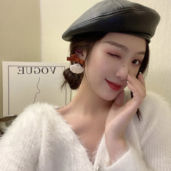 Pendientes de concha y perla en forma de corazón