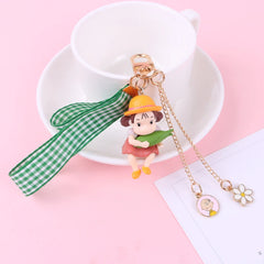 Llavero de bruja de dibujos animados