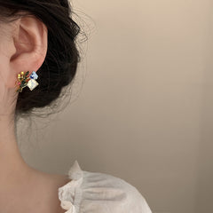 Pendientes de jungla de primavera en el país de las maravillas