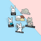 Pines de letras de hámster y conejo de dibujos animados