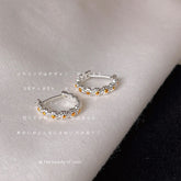 Round Daisy Silver Small Ear Buckles