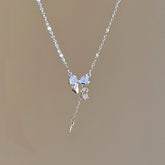 Lindo collar con lazo y borlas