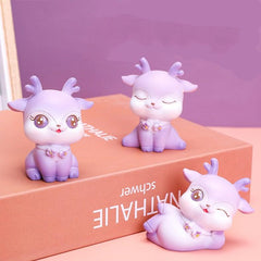 Adornos de resina de ciervo morado