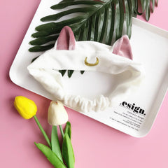 Diadema con orejas de gato en forma de media luna