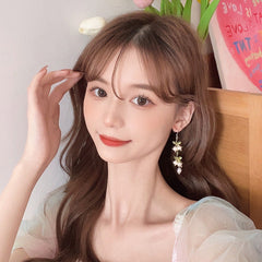 Pendientes vintage de lirio de los valles con perlas