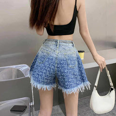 Shorts vaqueros con flecos en degradado azul