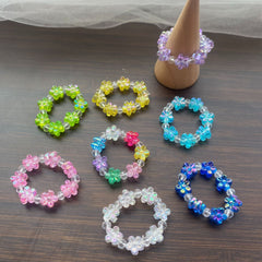 Anillo de cristal con flor dulce