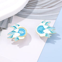 Alfileres de ojos y plumas con alas de dibujos animados