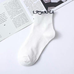 Süße Baumwollsocken mit Spitze