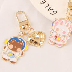 Lindo llavero de corazón de nave espacial