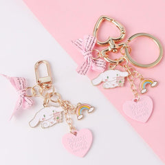 Lindo llavero de cachorro arcoíris