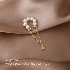 Puño de oreja con borla de perla de agua dulce