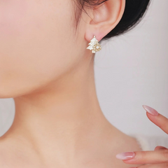 Pendientes de árbol de Navidad con copos de nieve giratorios