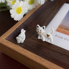 Pendientes asimétricos de gatito floral