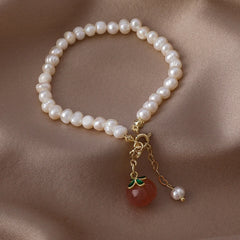 Perlenpfirsich-Armband