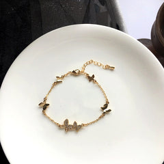 Pulsera de mariposa para niña dulce