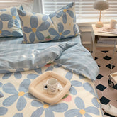 Juego de cama con flores azules, fresa y cereza