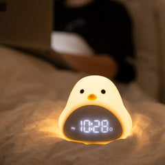 Reloj despertador con luz nocturna y bonito pájaro