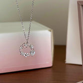 Collar de corona de la suerte con mariposa