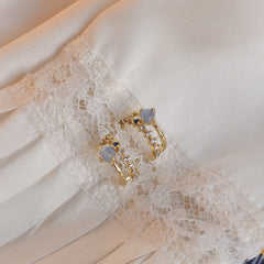 Pendientes delicados de estrella de una noche de verano