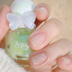 Esmalte de uñas dorado con purpurina Super Fairy