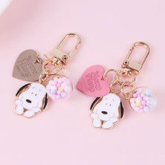 Llavero con forma de perro y bola de colores en forma de corazón