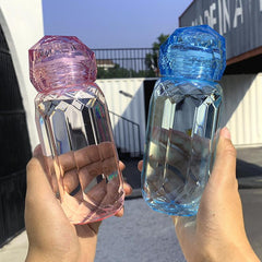 Botella de agua de sección irregular