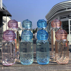 Botella de agua de sección irregular