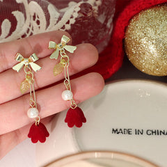 Pendientes de rosa de terciopelo con lazo de tulipán