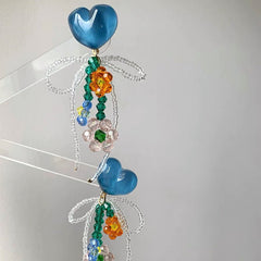 Pendientes de flores con cuentas azules