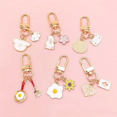 Lindo llavero de metal con dibujos animados