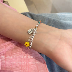 Pulsera de cuentas de cristal de colores