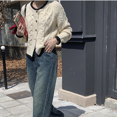 Suéter tipo cárdigan de punto con giro