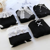 Braguitas de encaje negro con forma de corazón