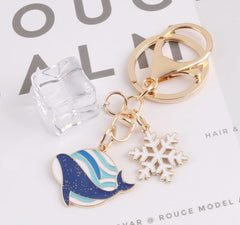Llavero de copo de nieve con forma de ballena y bloque de hielo