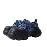 Botas vaqueras con suela de burbuja y lazo delantero