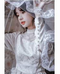 Vestido de novia estilo victoriano con detalles de perla Callina