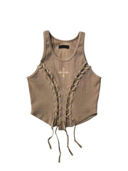 Top corto beige con cordones y estética vaquera del oeste