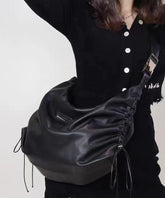 Black Faux Leather Drawstring Messenger Bag