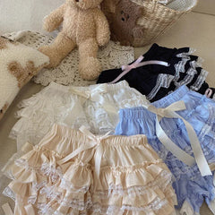 Pantalones cortos bombachos de encaje con volantes y cintas