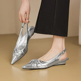 cowhide pointed toe wedge heel