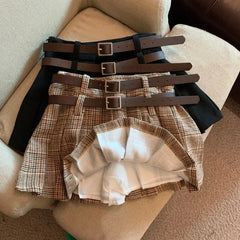 Minifalda plisada con pantalones cortos incorporados de Plaid Dark Academia