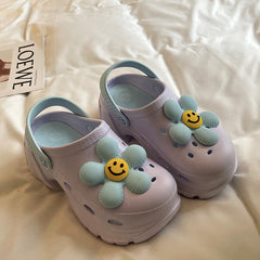 Sandalen mit dicker Plateausohle und Smiley-Blume