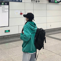 Türkisfarbenes, lockeres Kapuzen-Sweatshirt mit Retro-Aufdruck