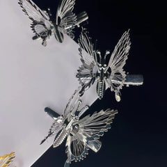 Pinza para el pelo con forma de mariposa antigua